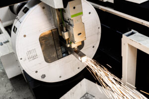 CNC Laser cutting metal square tube.