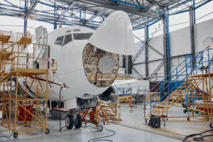 Professional plane expluatation service in big hangar