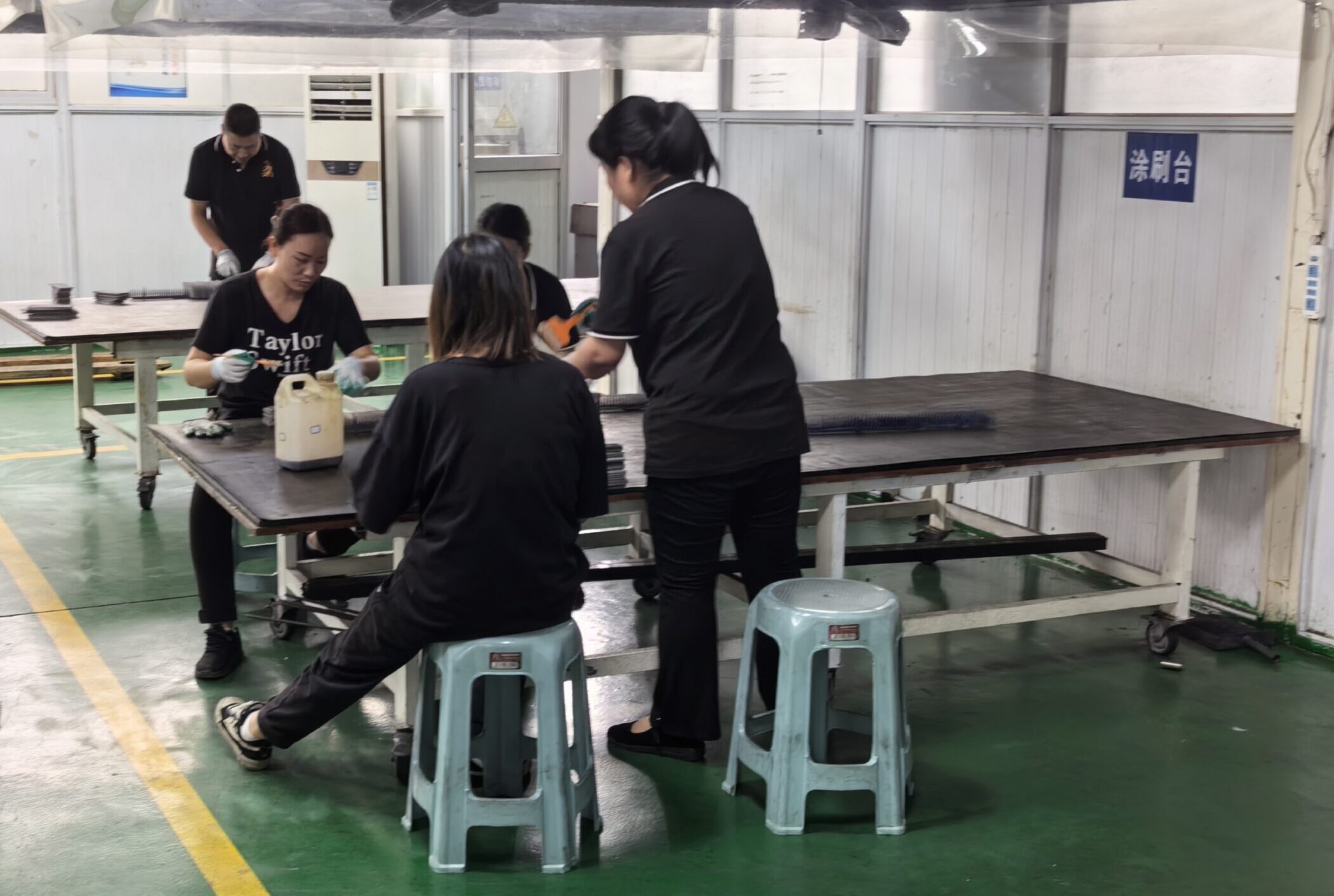 Titanium anode plates are being painted.