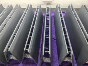 High-resolution composite image showing the multi-pass coating process used in titanium anode manufacturing. The left panel provides a clean visual flow of the steps: Coat → Dry → Oxidize → Cool. The right side displays real workshop photography, including manual brush coating of titanium plates and a high-temperature furnace glowing during thermal oxidation. This image illustrates the complete functional-layer build cycle for MMO and noble-metal titanium anodes.