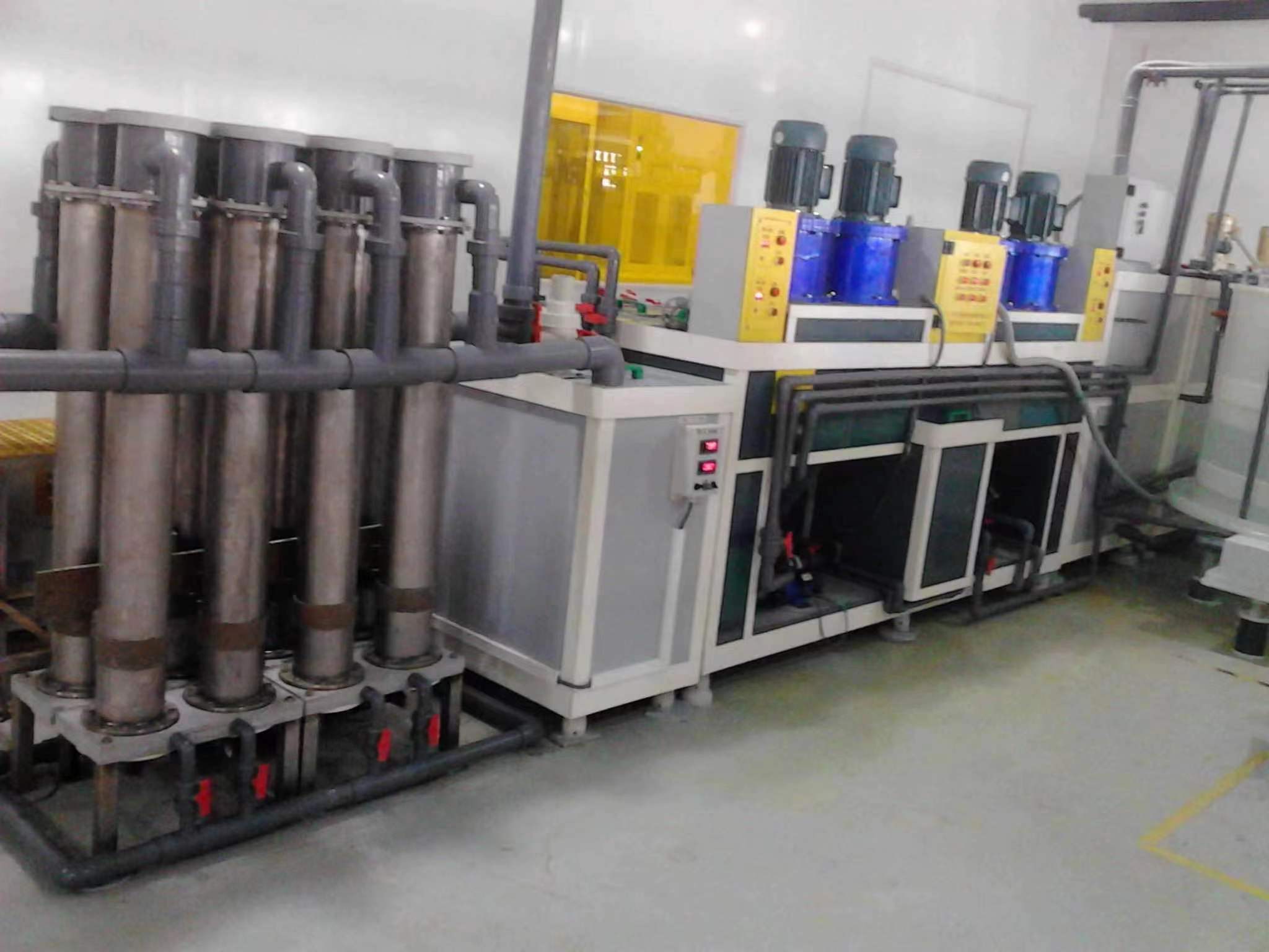 On-site sodium hypochlorite generator system with electrolytic cells and dosing pumps